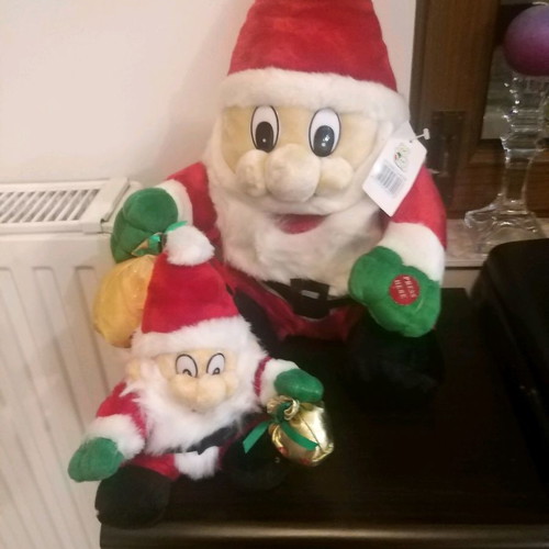 Santa Claus singing carols, new, pack of two sizes