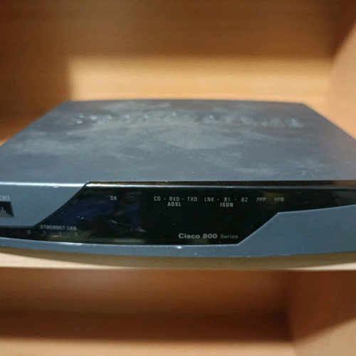 Cisco 800 router used desktop with 4-port Ethernet switch