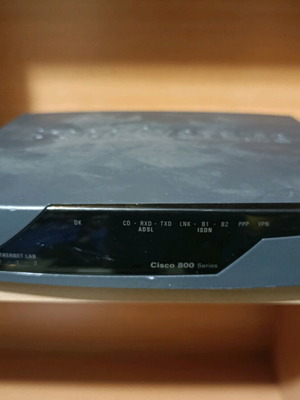 Cisco 800 router used desktop with 4-port Ethernet switch