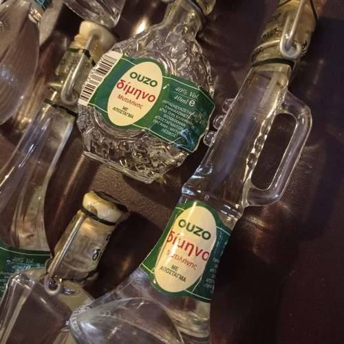 Miniature liquor bottles used, collection of 8 shaped like musical instruments