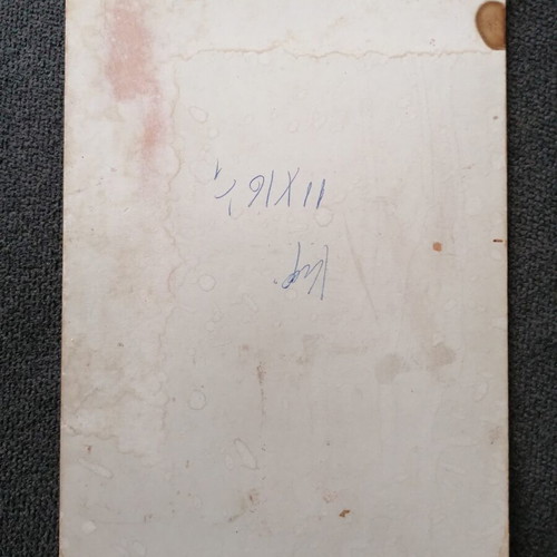 Photograph on thick cardboard used, with damages