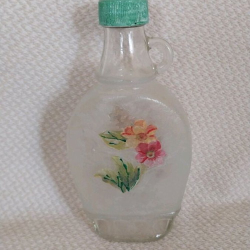 Handmade bottle decorated with decoupage technique, new