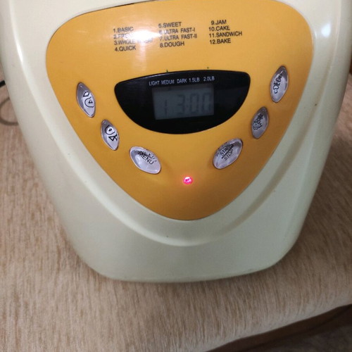 Bread maker used yellow with repaired bowl