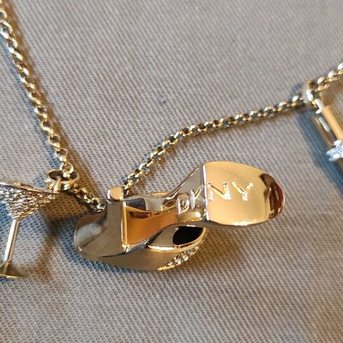 DKNY necklace chain new, gold color