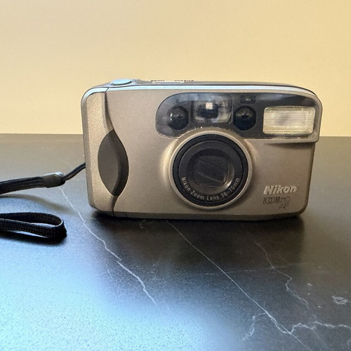 Nikon Zoom 210 AF camera used, retro style