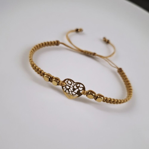 Macrame bracelet with gold steel heart