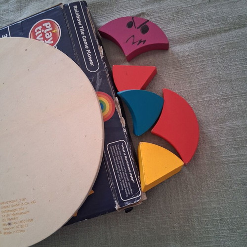 Wooden puzzle for ages 3+ used with cards and box
