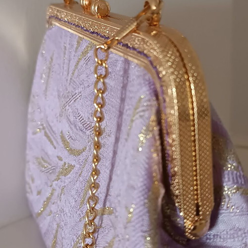 Vintage shoulder bag new in purple and gold shades with floral lining