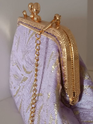Vintage shoulder bag new in purple and gold shades with floral lining