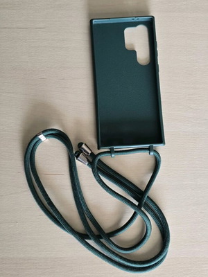 Samsung S24 Ultra case used with green silicone lanyard