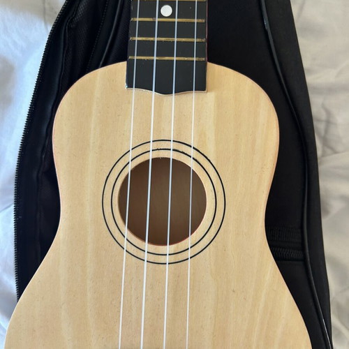 Ukulele like new with torn bag