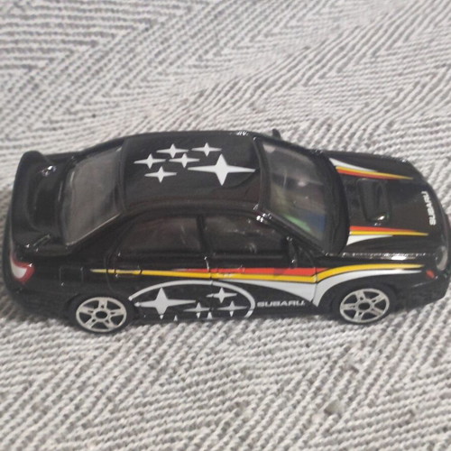 Subaru Impreza WRX STi metal miniature used, 1:43 scale by Burago