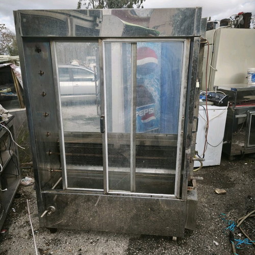 Gas grill used with seven skewers stainless steel