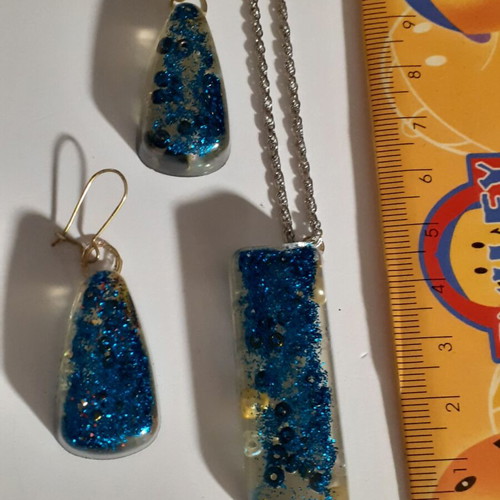 Set of 9 handmade resin pendant and earring jewelry sets, multicolor