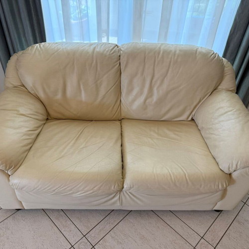 Two-seater sofa used beige leatherette with free three-seater sofa