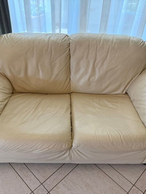 Two-seater sofa used beige leatherette with free three-seater sofa