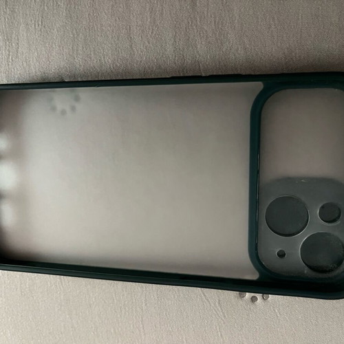 iPhone 13 / 14 phone case used, transparent with green border
