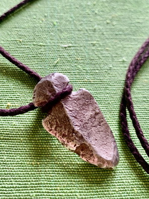 Men's silver 925 pendant like new with brown cord