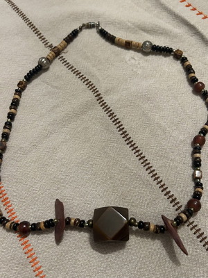 Necklace with various beads in brown beige shades, like new