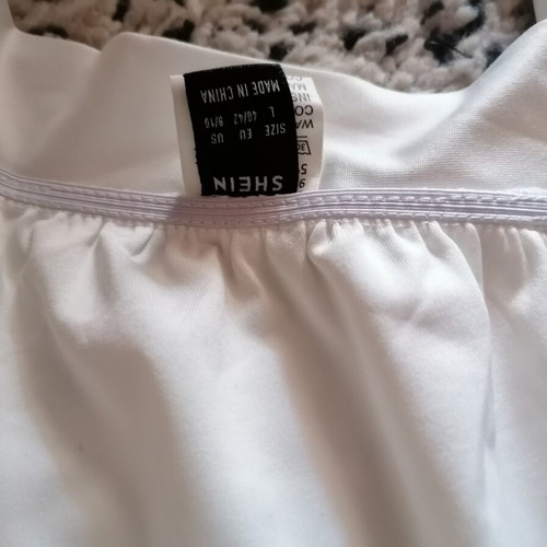 White sleeveless top Shein like new, deep V-neck, tie waist
