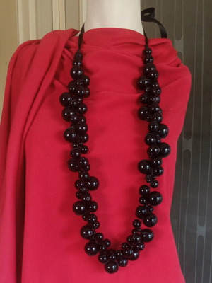 Long statement necklace with black cluster beads and satin ribbon like new