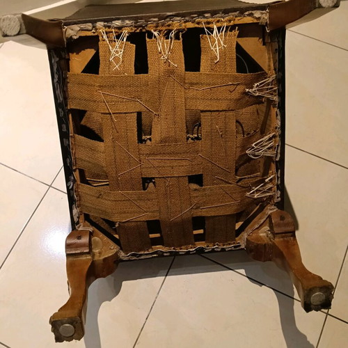 Set of two low chairs used with leatherette and wooden frame