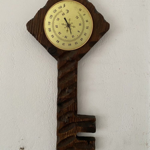 Vintage wooden key holder with analog thermometer used