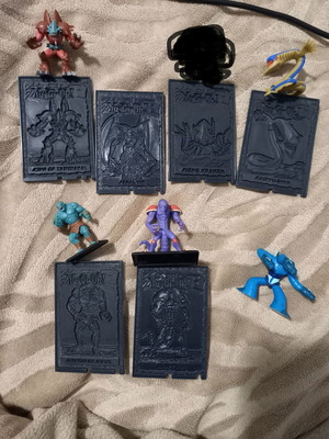 Yugioh figures in good condition with collectible cards