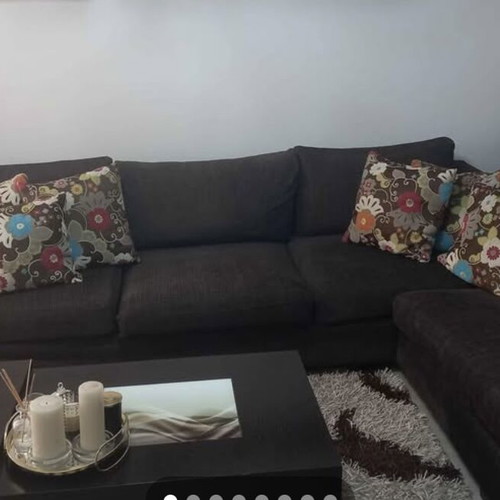 Corner sofa set used with two stools and coffee table with storage