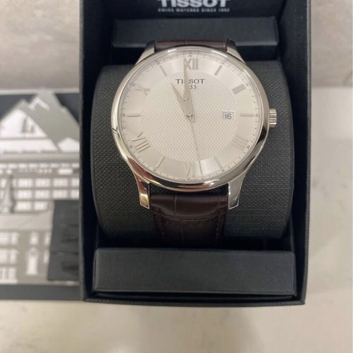 Tissot Tradition watch with brown leather strap