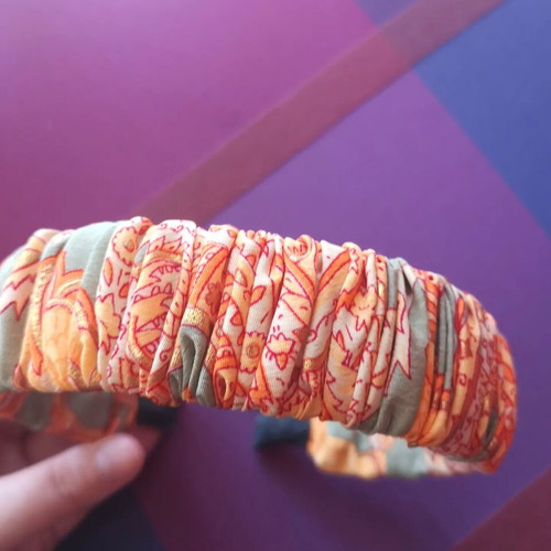 Orange headband with paisley pattern new