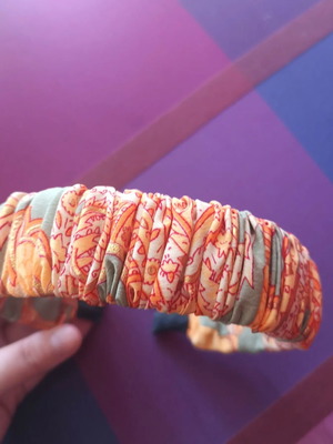 Orange headband with paisley pattern new