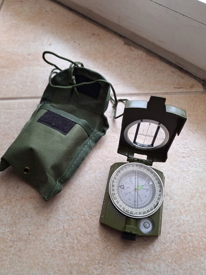 Compass with sight like new, with case