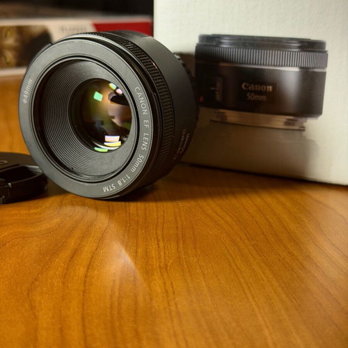 Canon EF 50mm F1.8 STM lens like new with box and papers