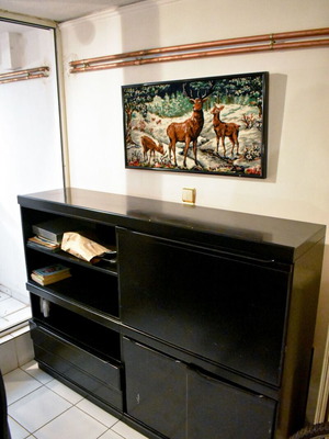 Black sideboard used, needs repair