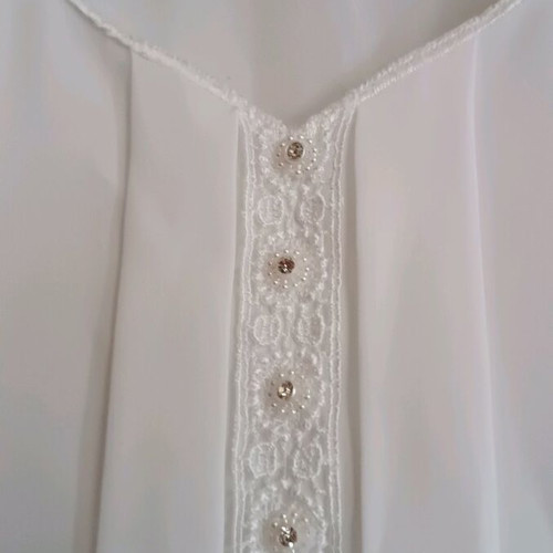 Sleeveless women's top white size XL like new