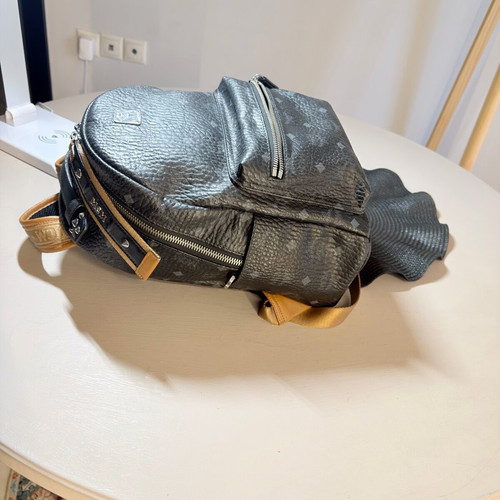 Mcm backpack used, medium size, black and brown