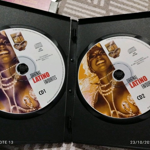 Latin music CD like new, 2 CDs