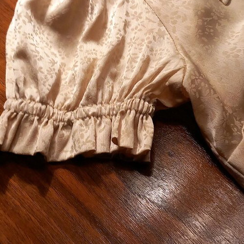 Satin wrap shirt medium champagne color with print