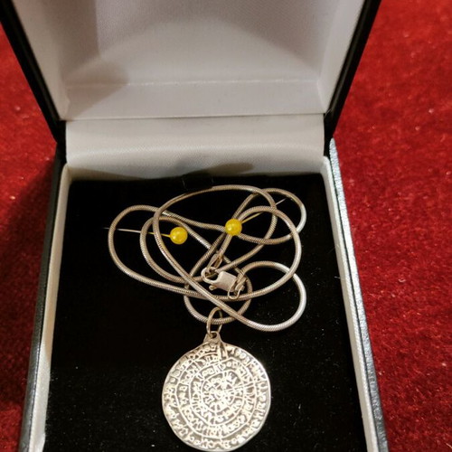 Necklace with 9.25 silver chain and Phaistos disc like new