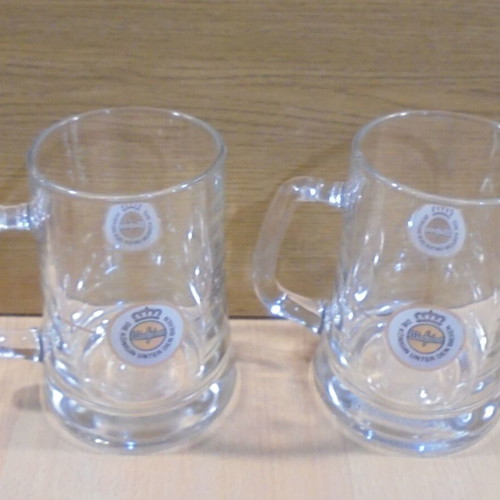 Warsteiner beer set of two used promotional glass mugs 0.5l