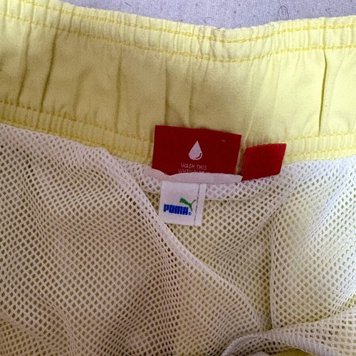 Puma men's yellow swim shorts, new
