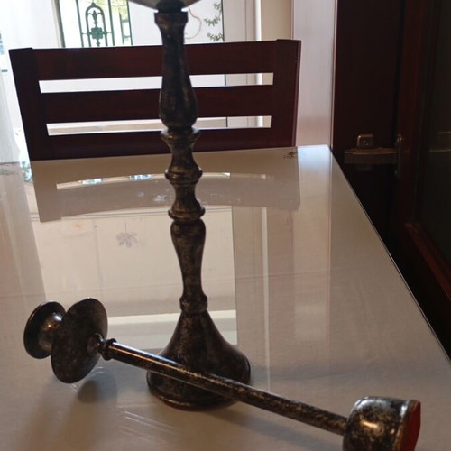 Two used classic iron decorative candlesticks 29 and 26 cm