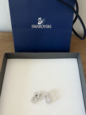 Swarovski stud earrings new with pavé crystal infinity design