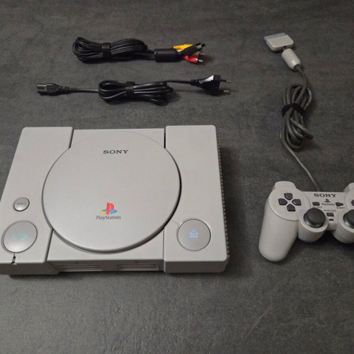 Sony PlayStation SCPH-7502 PS1 console used with Dualshock controller