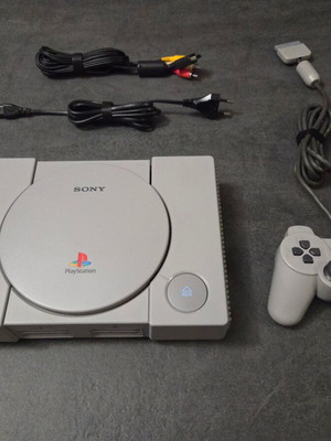 Sony PlayStation SCPH-7502 PS1 console used with Dualshock controller