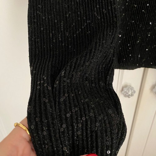 Black sequin blouse with puffed shoulders size M