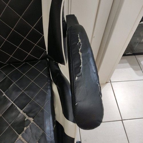 Gaming chair used with footrest made of leatherette