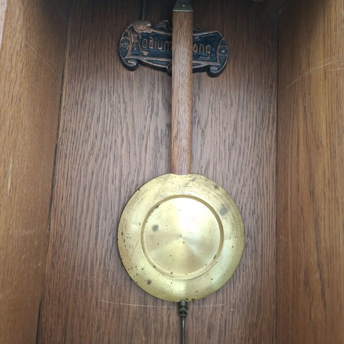 Wooden Radium wall clock used with vintage pendulum