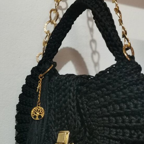 Handmade women's crossbody bag black with gold details shell shape